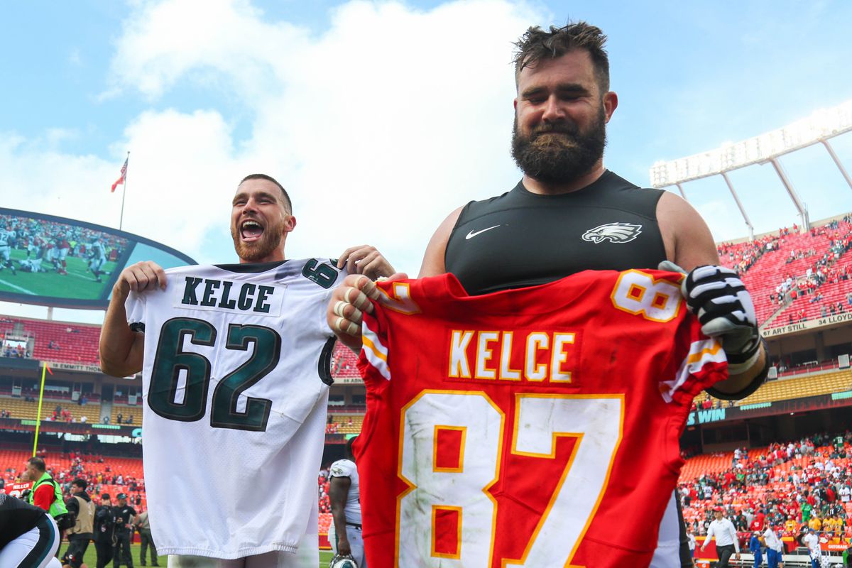Kansas City Chiefs tight end Travis Kelce (87) and Philadelphia Eagles center Jason Kelce (62) swap jersey after the game at Arrowhead Stadium
