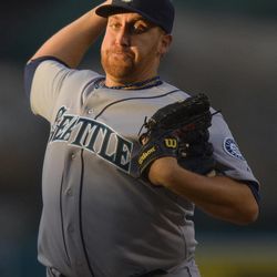 Seattle Mariners starting pitcher Aaron Harang (39) delivers against the Los Angeles Angels in the first inning of a baseball game, Monday, June 17, 2013 in Anaheim, Calif.  