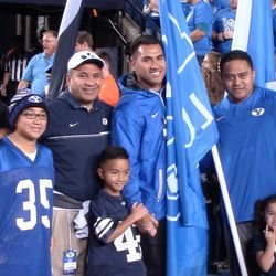 Former BYU running backs, from left, Lakei Heimuli, Vai Sikahema, Harvey Unga, Manase Tonga and Fui Vakapuna pose for a photo prior to the Cougars' game against Mississippi State at LaVell Edwards Stadium on Friday, Oct. 14, 2016. Heimuli, Unga and Tonga ran out the alumni flags before the game.