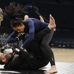 Joanna Jedrzejczyk shows off an elbow at UFC 217 workouts.