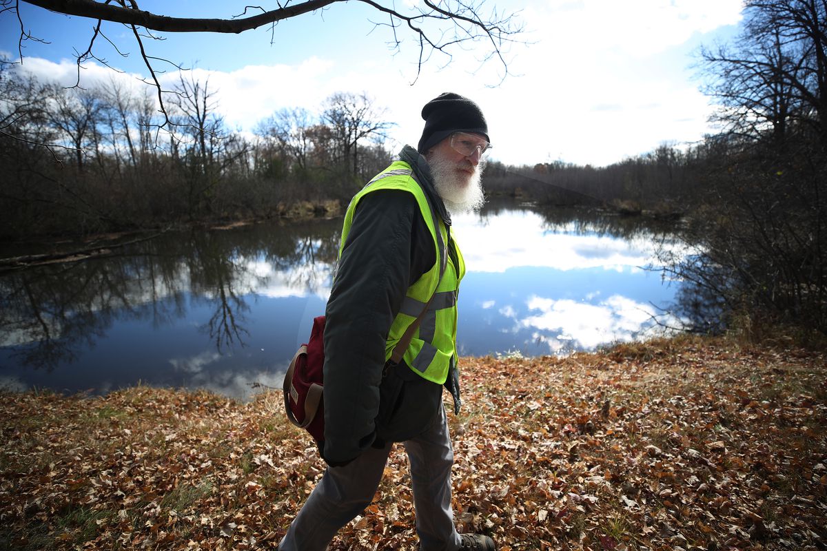 Greg Niemuth of Eau Claire searched along the Yellow river around 15 avenue near highway 25 just north of town for missing 13-year-old Jayme Closs Tuesday October 23, 2018 in Barron, WIS. ] Jerry Holt ‚Ä¢ Jerry.holt@startribune.com