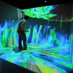 Idaho National Laboratory researchers view a subsurface geothermal energy model in the Computer-Assisted Virtual Environment at the Center for Advanced Energy Studies.