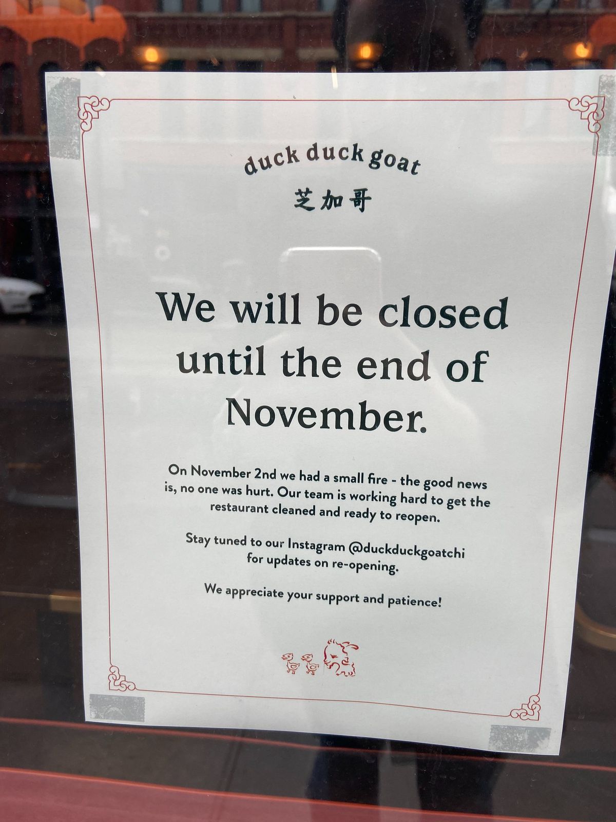 A paper sign taped to a window reads “We will be closed until the end of November.”