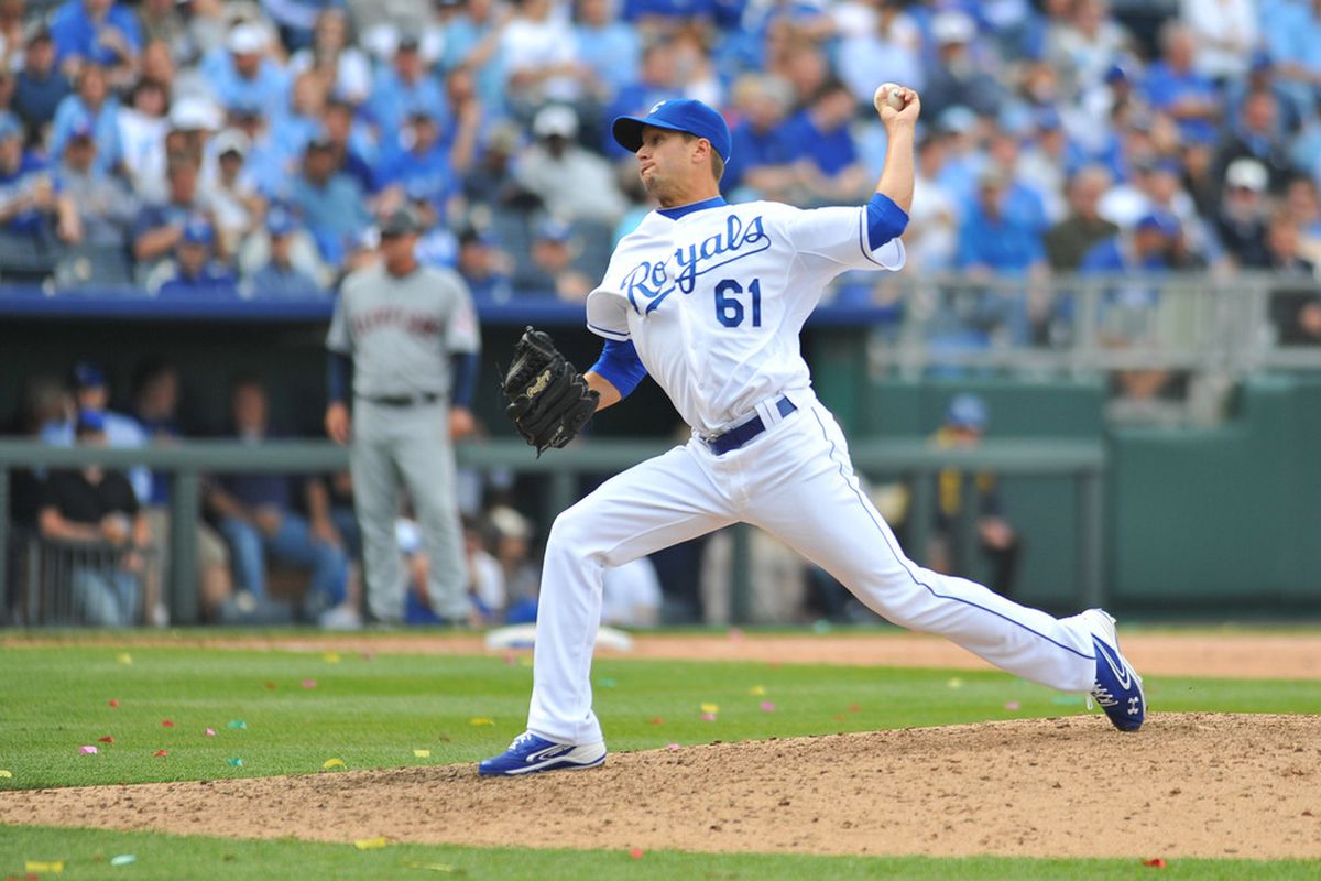 April 13, 2012; Kansas City, MO, USA; Kansas City Royals relief pitcher Everett Teaford (61) delivers a pitch in the eighth inning against the Cleveland Indians at Kauffman Stadium. The Indians won 8-3.  Mandatory Credit: Denny Medley-US PRESSWIRE
