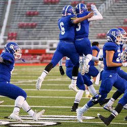 Bingham celebrates after winning over Lone Peak 17-10 in the 5A football State Championship game at Rice-Eccles Stadium in Salt Lake City on Friday, Nov. 18, 2016.