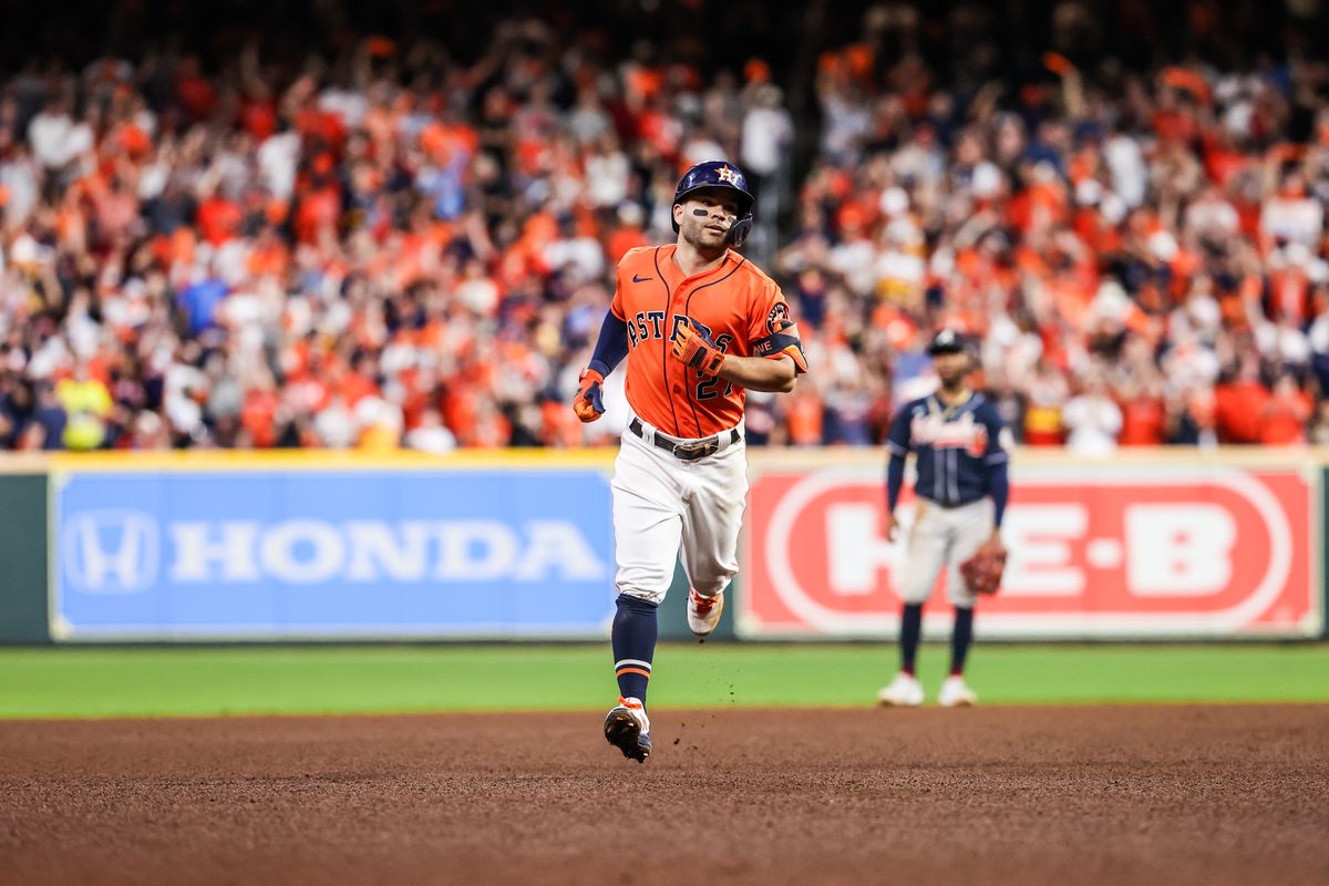 Jose Altve, #27 of the Houston Astros hits a home run during Game 2 of the 2021 World Series between the Atlanta Braves and the Houston Astros at Minute Maid Park on Wednesday, October 27, 2021 in Houston, Texas.
