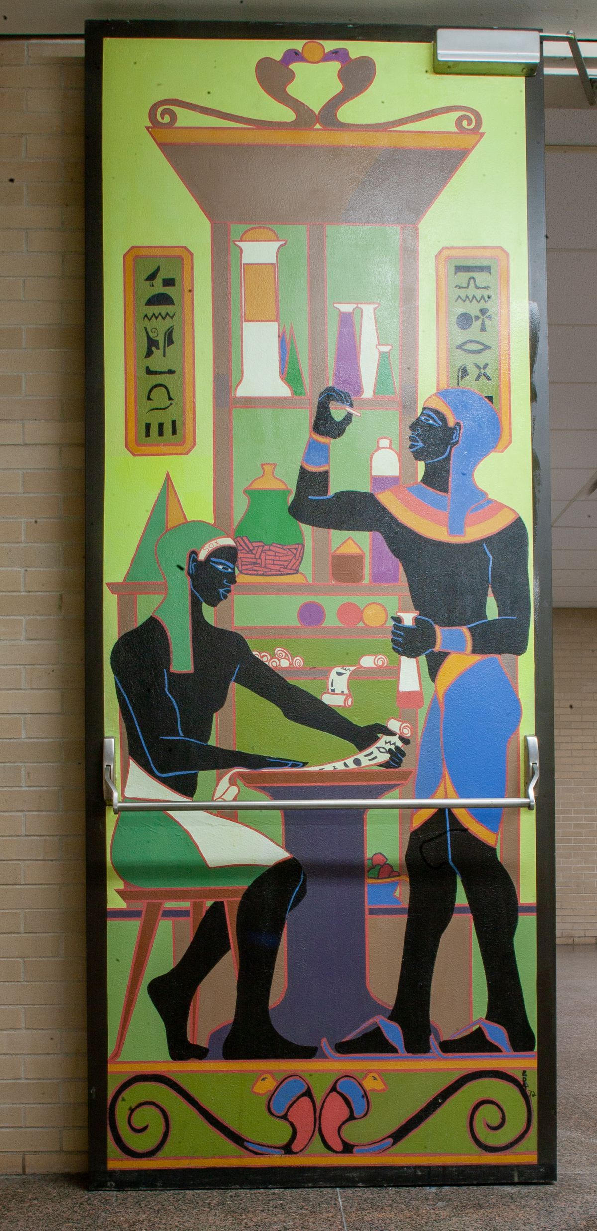 Eugene “Eda” Wade painted designs that transformed the steel fire doors at Malcolm X College.