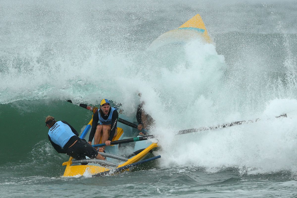 The Bilgola suf life saving crew paddle through a wave during the Ocean Thunder Surf Boat Series at Dee Why Beach on February 2, 2013 in Sydney, Australia. 