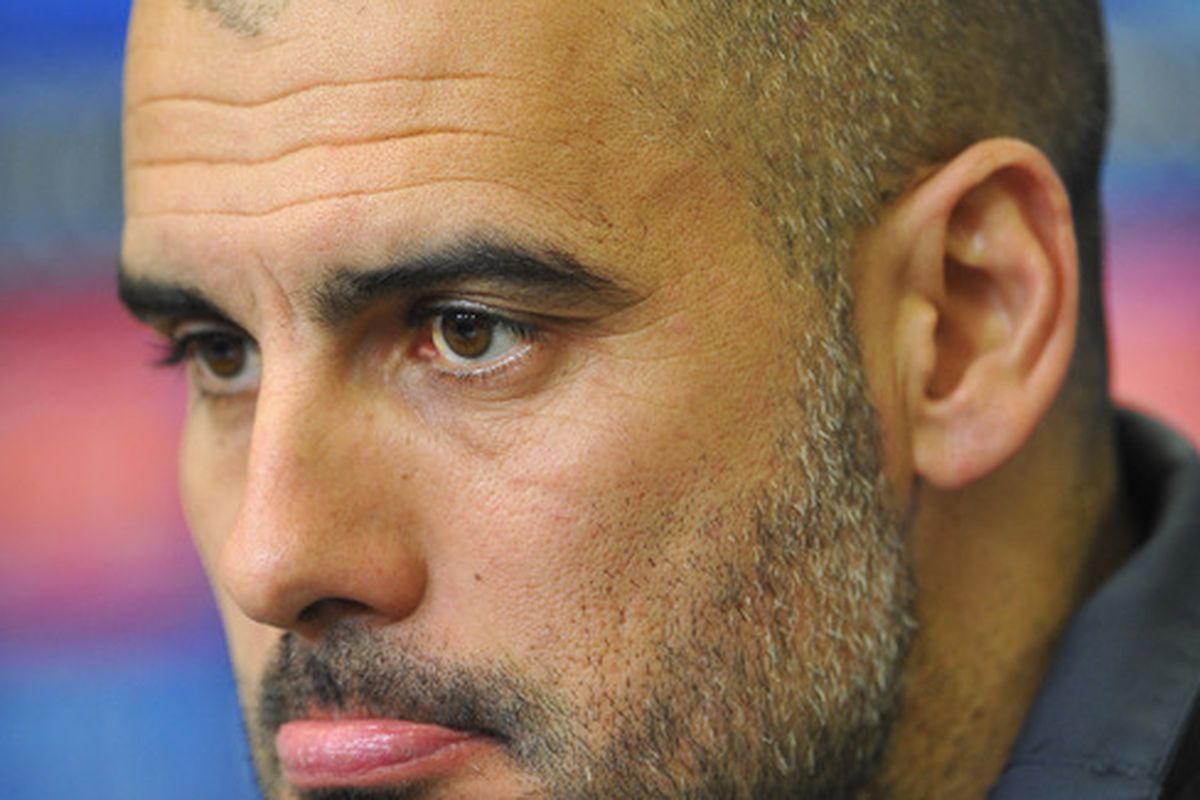 Pep Guardiola, head coach of FC Barcelona addresses the media during a press conference at the BayArena in Leverkusen, Germany.  (Photo by Stuart Franklin/Bongarts/Getty Images)
