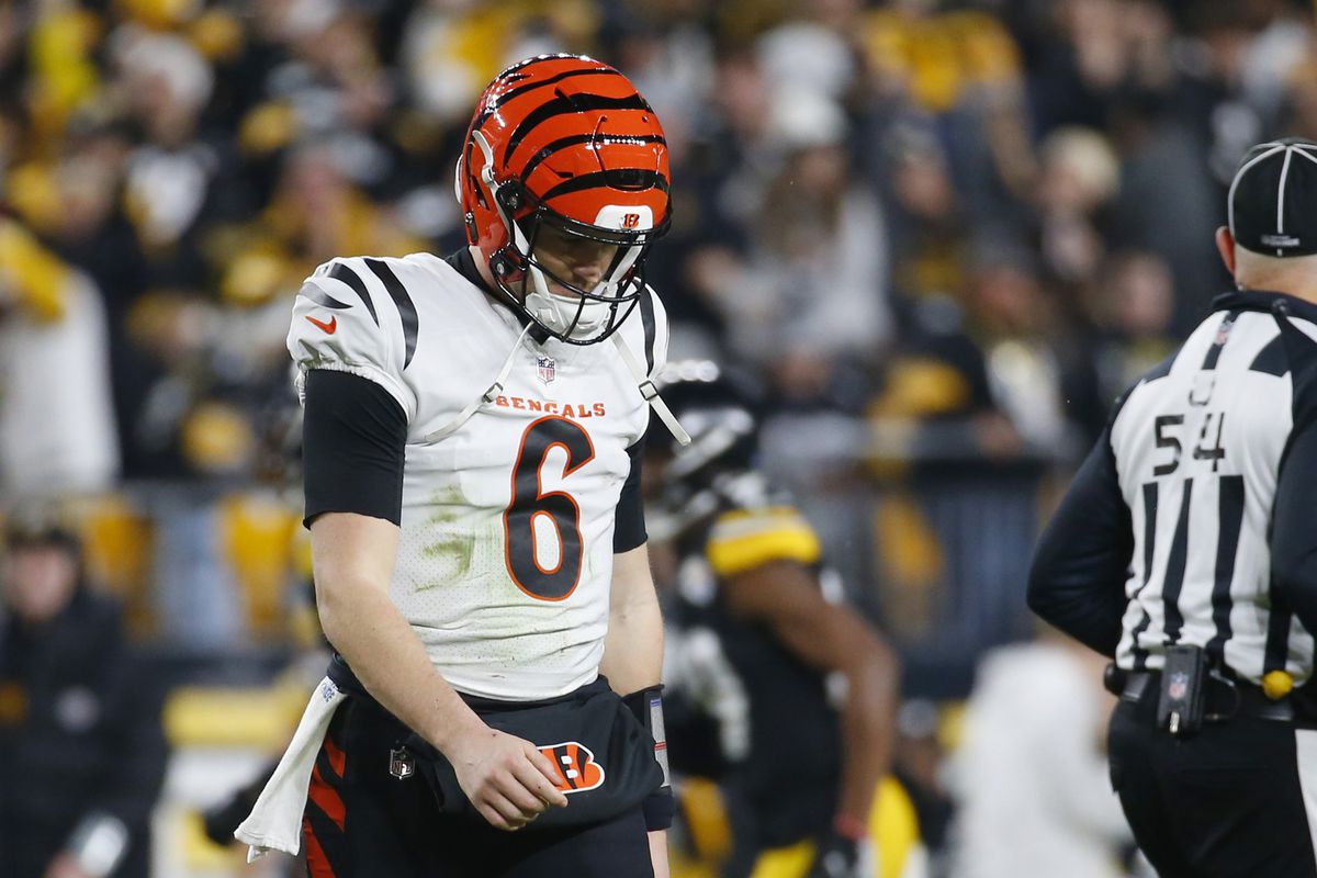 Jake Browning #6 of the Cincinnati Bengals walks off the field after throwing an interception during the fourth quarter of a game against the Pittsburgh Steelers at Acrisure Stadium on December 23, 2023 in Pittsburgh, Pennsylvania.