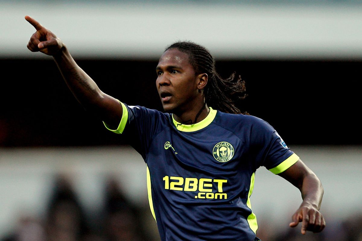 Hugo Rodallega of Wigan celebrates after scoring a goal from a free kick during the Barclays Premier League match between Queens Park Rangers and Wigan Athletic at Loftus Road