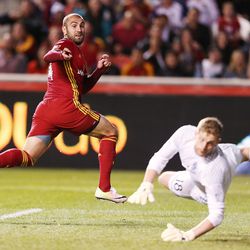 Real Salt Lake forward Yura Movsisyan (14) shoots and scores on Colorado Rapids goalkeeper Zac MacMath (18) but was called off side during MLS action in Sandy Saturday, April 9, 2016. Real Salt Lake won 1-0.