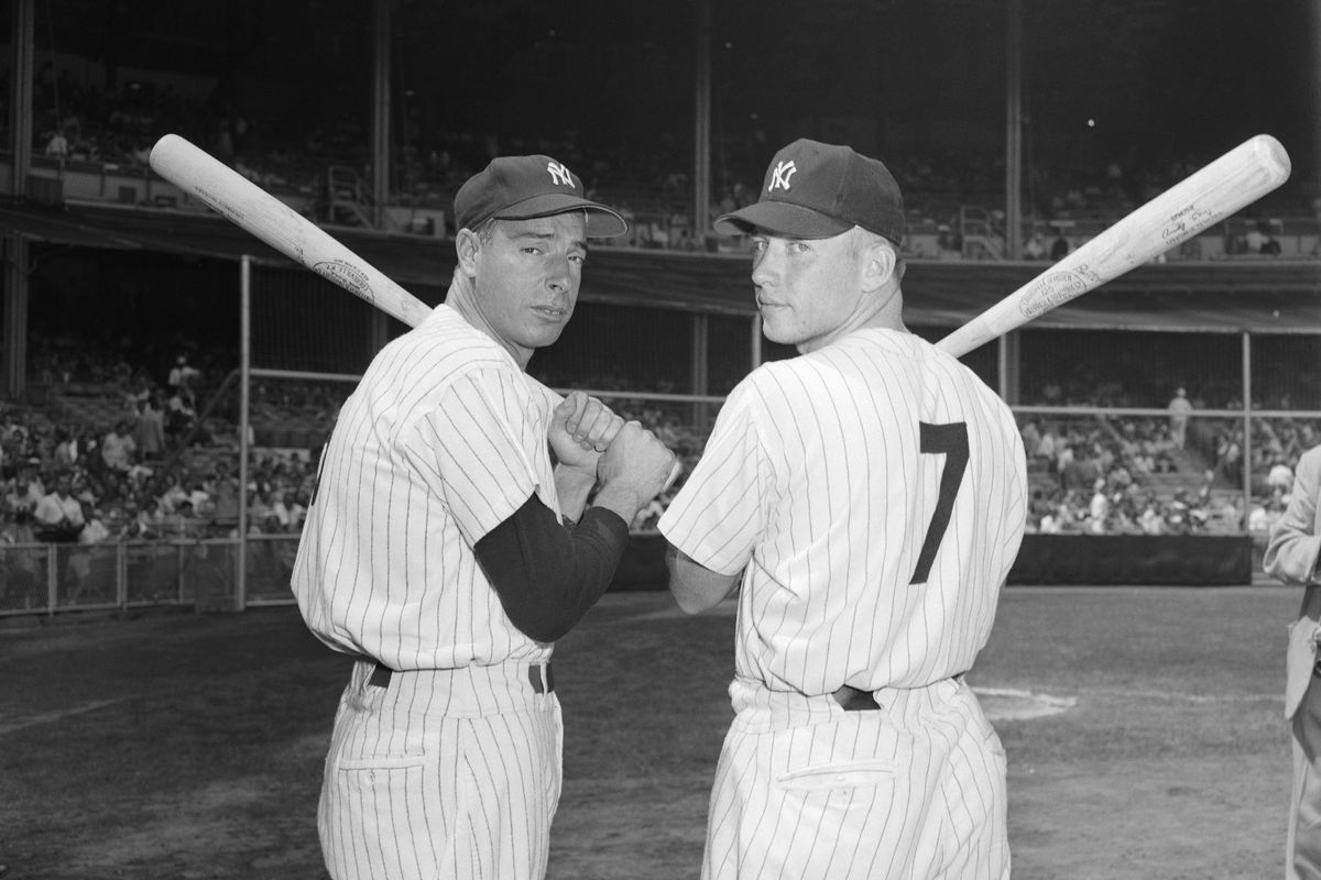 Joe DiMaggio and Mickey Mantle Holding Bats