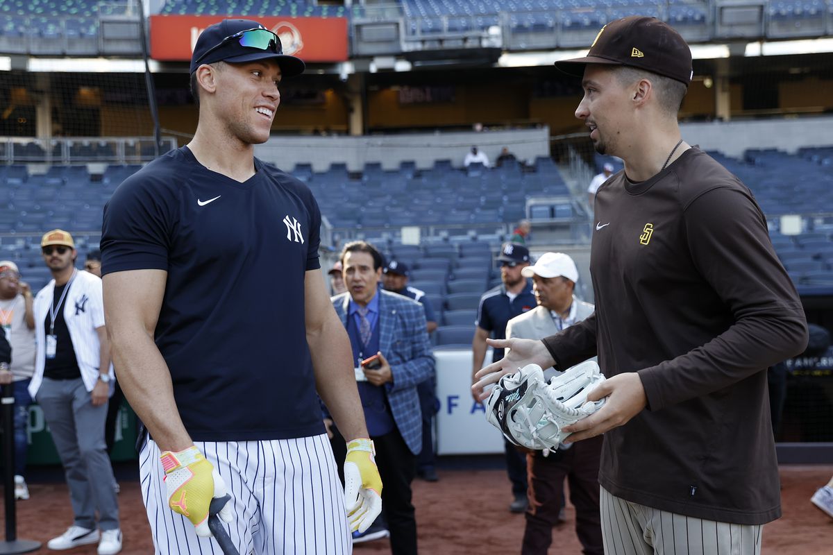 Aaron Judge of the New York Yankees and Blake Snell of the San Diego Padres talk before the game at Yankee Stadium on May 26, 2023, in New York, New York.