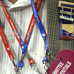Indiana delegate Daniel Dumezich fashions his credential lanyards and badge on his jacket at the Republican National Convention in Tampa, Fla., on Monday, Aug. 27, 2012. 