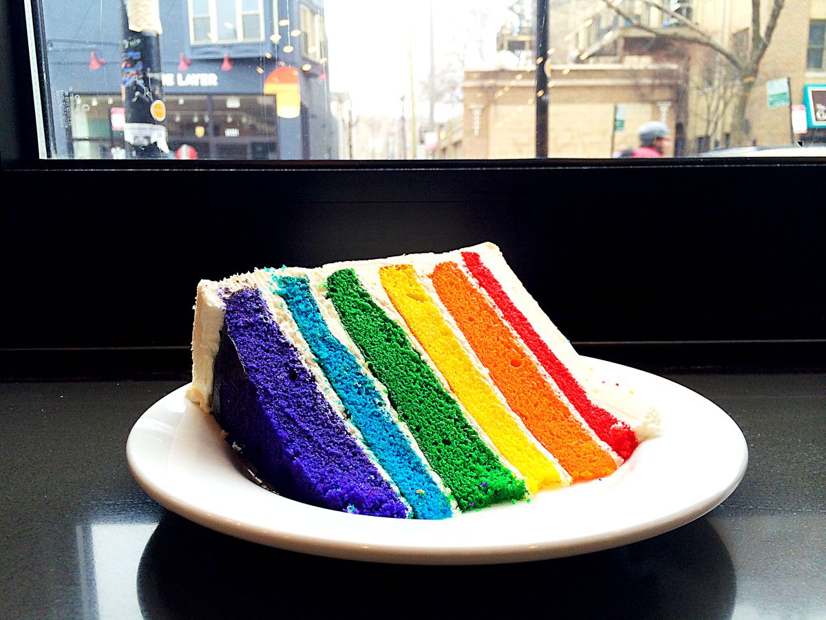 A slice of rainbow cake.