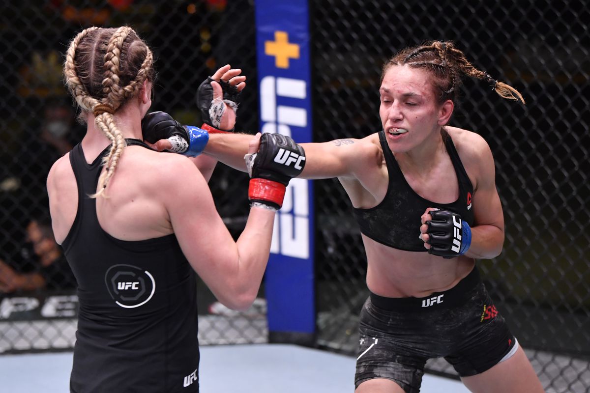 Antonina Shevchenko of Kyrgyzstan punches Katlyn Chookagian in their flyweight fight during the UFC Fight Night event at UFC APEX on May 30, 2020 in Las Vegas, Nevada.