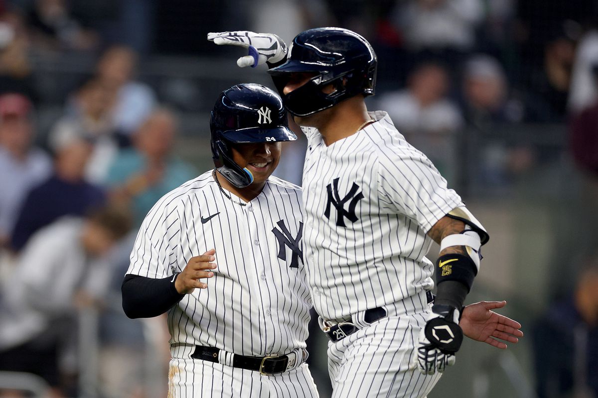 Willie Calhoun celebrates after he scored on a two run home run by Gleyber Torres of the New York Yankees during game two of a double header against the Chicago White Sox at Yankee Stadium on June 8, 2023 in Bronx borough of New York City.