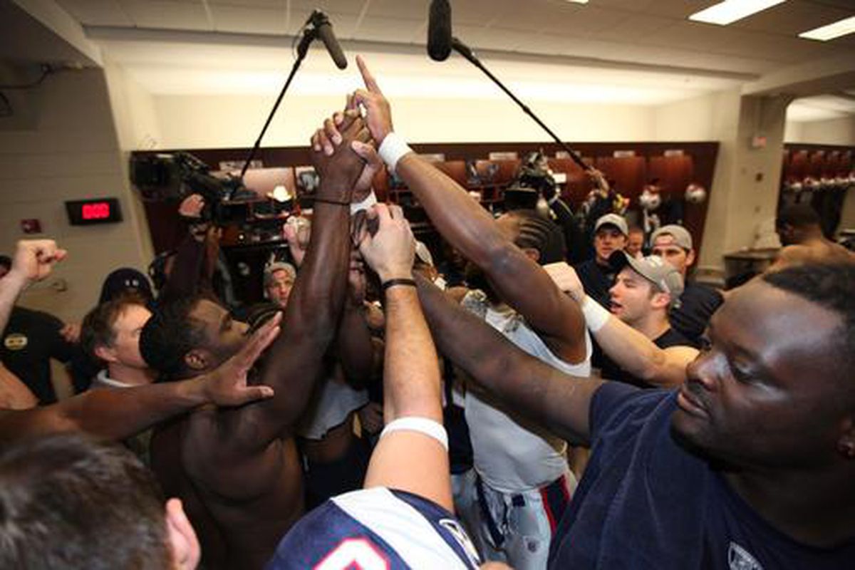 New England Patriots celebrate their win over Jacksonville and earning the division champion title.