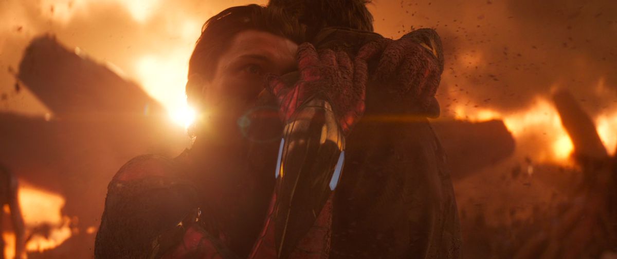 Peter Parker/Spider-Man (Tom Holland) clings to Tony Stark/Iron Man (Robert Downey Jr.)’s shoulder in Avengers: Infinity War.