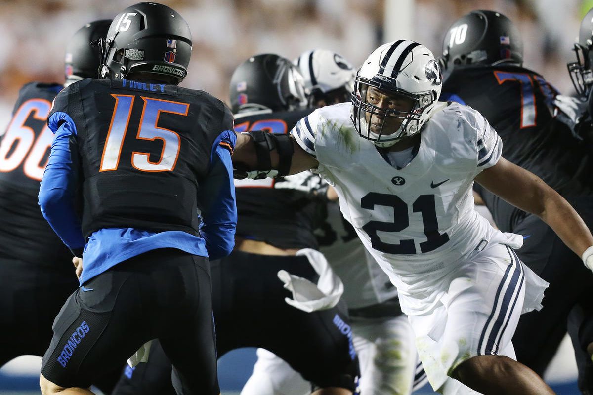 Brigham Young Cougars linebacker Harvey Langi (21) goes after Boise State Broncos quarterback Ryan Finley (15) BYU and Boise State play Saturday, Sept. 12, 2015, at LaVell Edwards Stadium in Provo.