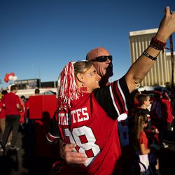 Tiffany and Ron McCarty, of Kearns, take a photo together as Utah fans congregate outside Allegiant Stadium in Las Vegas before the Utes face the Oregon Ducks in the Pac-12 championship game on Friday, Dec. 3, 2021.