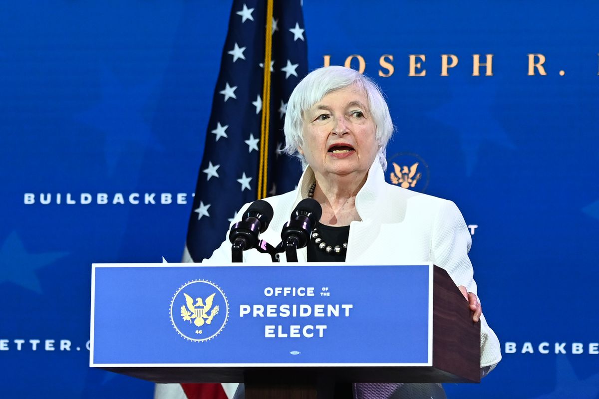 Janet Yellen speaking at a podium.