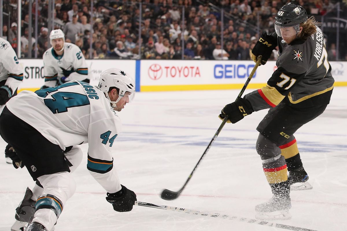 LAS VEGAS, NV - APRIL 26: William Karlsson #71 of the Vegas Golden Knights shoots the puck past Marc-Edouard Vlasic #44 of the San Jose Sharks in Game One of the Western Conference Second Round during the 2018 NHL Stanley Cup Playoffs at T-Mobile Arena on