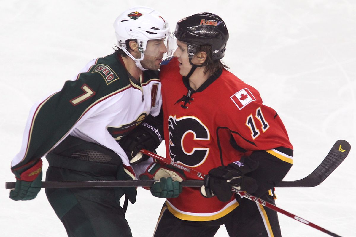 Potential Sharks trade targets Matt Cullen and Mikael Backlund look longingly into each other's eyes.
