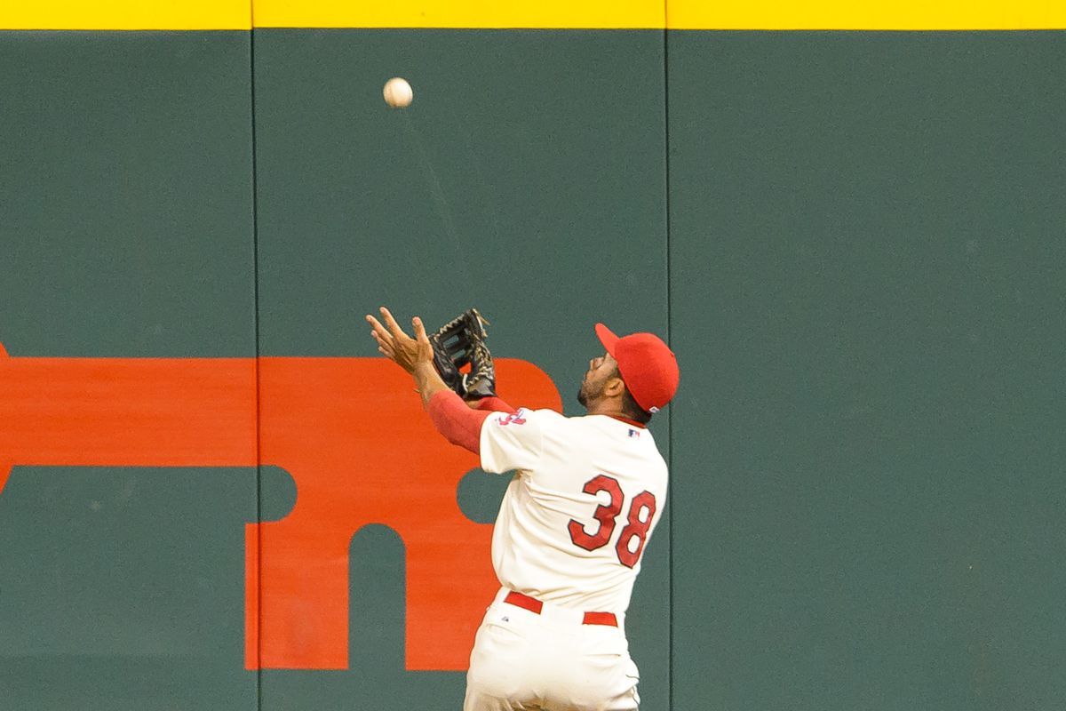 Chris Dickerson takes a very circuitous route to this ball, but does end up catching it.