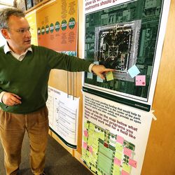 Soren Simonsen, chairman of the Pioneer Park Urban Design Assistance Team points out ideas for the park Sunday, Feb. 8, 2015, during a brainstorming session for ideas of what could be done with the downtown park.