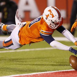 Timpview's Gabe Reid recovers an errant snap on a Woods Cross punt in the 4A State semi final game in Salt Lake City  Thursday, Nov. 14, 2013. The played resulted in a touchdown. 