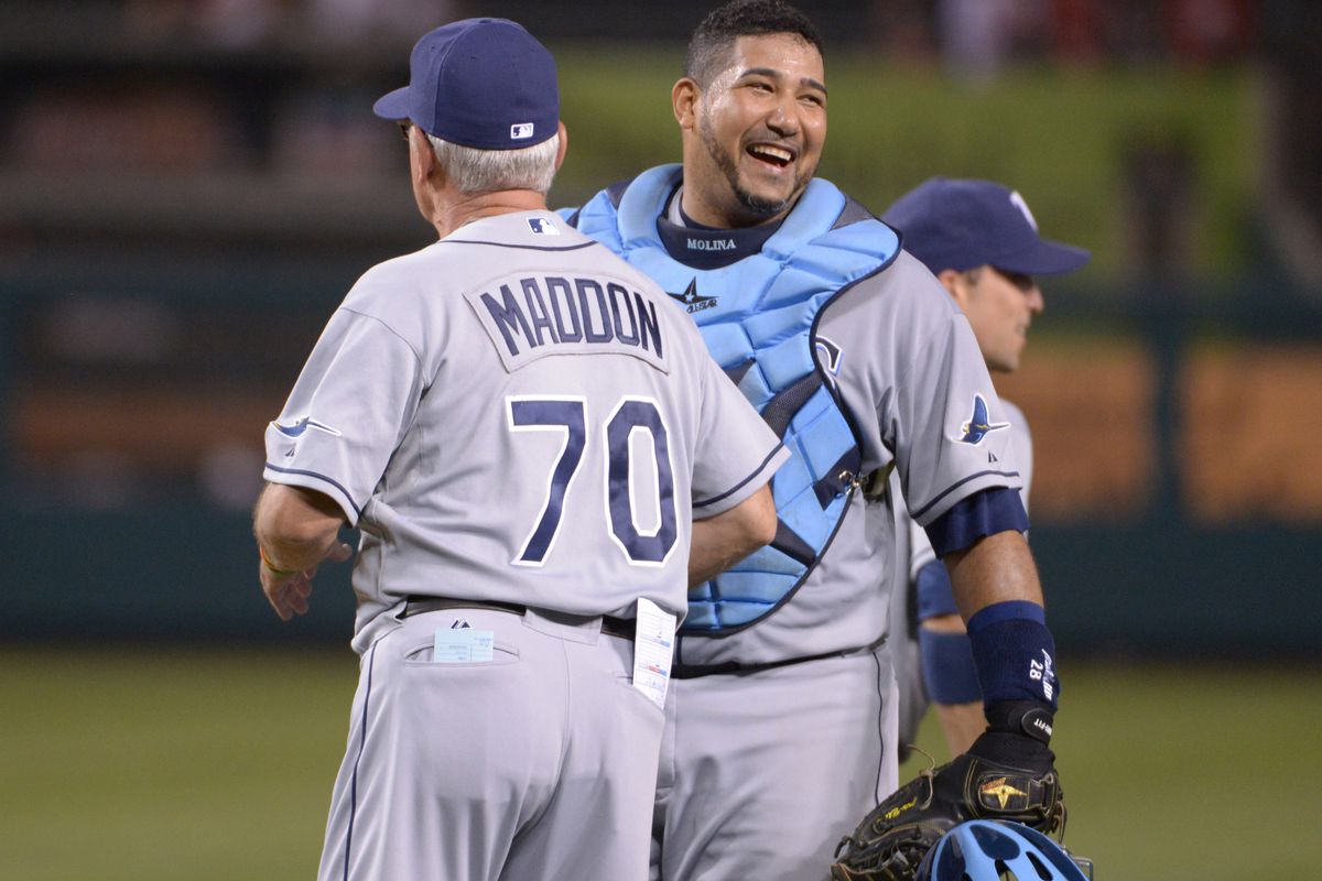 Jose Molina laughs, knowing that even if Maddon comes back, at least he won't have to.