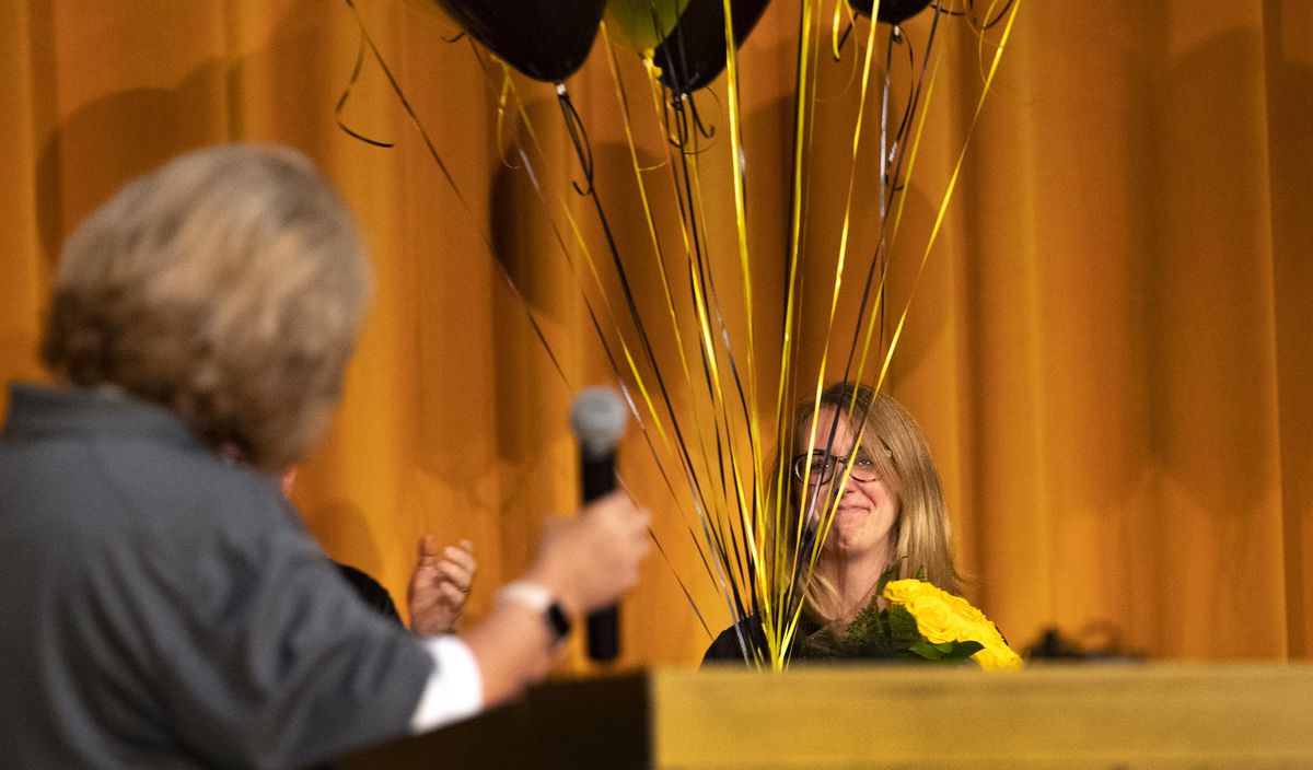 English teacher Lauren Merkley smiles through tears as the Cottonwood High School student body gives her a standing ovation as she is recognized as the Utah State Board of Education’s 2020 Utah Teacher of the Year during a homecoming assembly at the Murray school on Friday, Sept. 6, 2019.