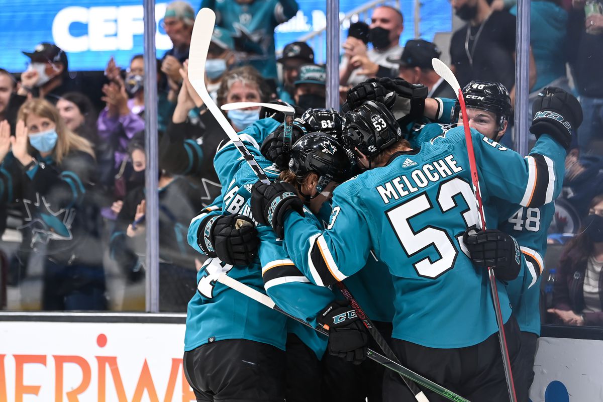 Tomas Hertl #48, Nicolas Meloche #53, Alexander Barabanov #94 and Timo Meier #28 of the San Jose Sharks celebrate a goal against the Winnipeg Jets at SAP Center on October 30, 2021 in San Jose, California.