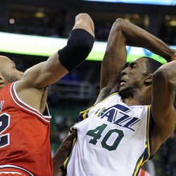 Utah Jazz small forward Jeremy Evans (40) looks for an outlet as Chicago Bulls power forward Taj Gibson (22) gives pressure during a game at EnergySolutions Arena on Monday, Nov. 25, 2013.