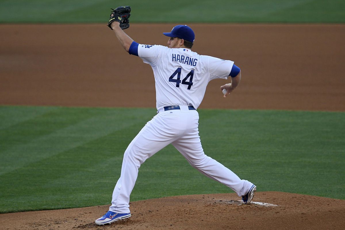 LOS ANGELES, CA - MAY 12:  Aaron Harang #44 of the Los Angeles Dodgers throws a pitch against the Colorado Rockies on May 12, 2012 at Dodger Stadium in Los Angeles, California.  (Photo by Stephen Dunn/Getty Images)