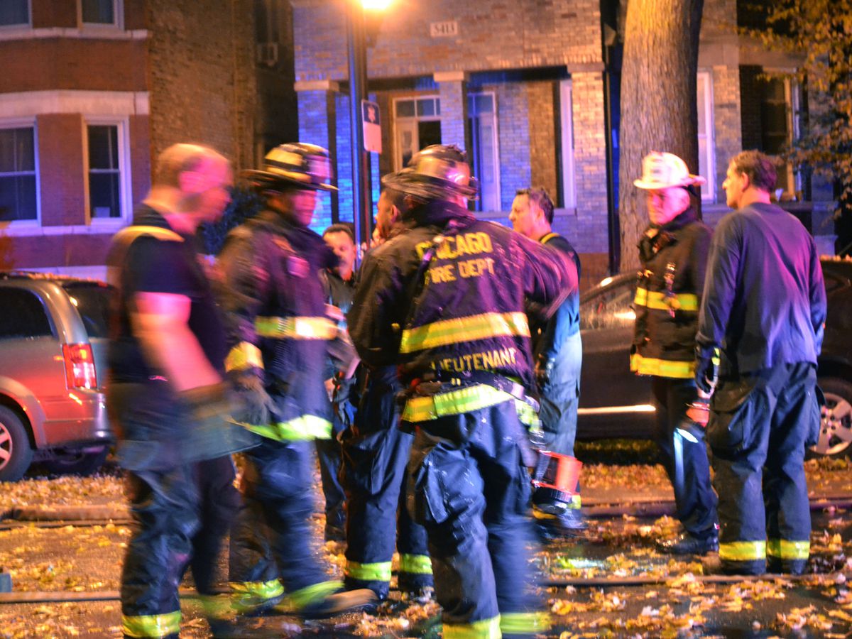 Fire officials investigate a fire about 1 a.m. Sunday, November 4, 2018 in the 5400 block of South Damen Avenue in Chicago. | Justin Jackson/ Sun-Times