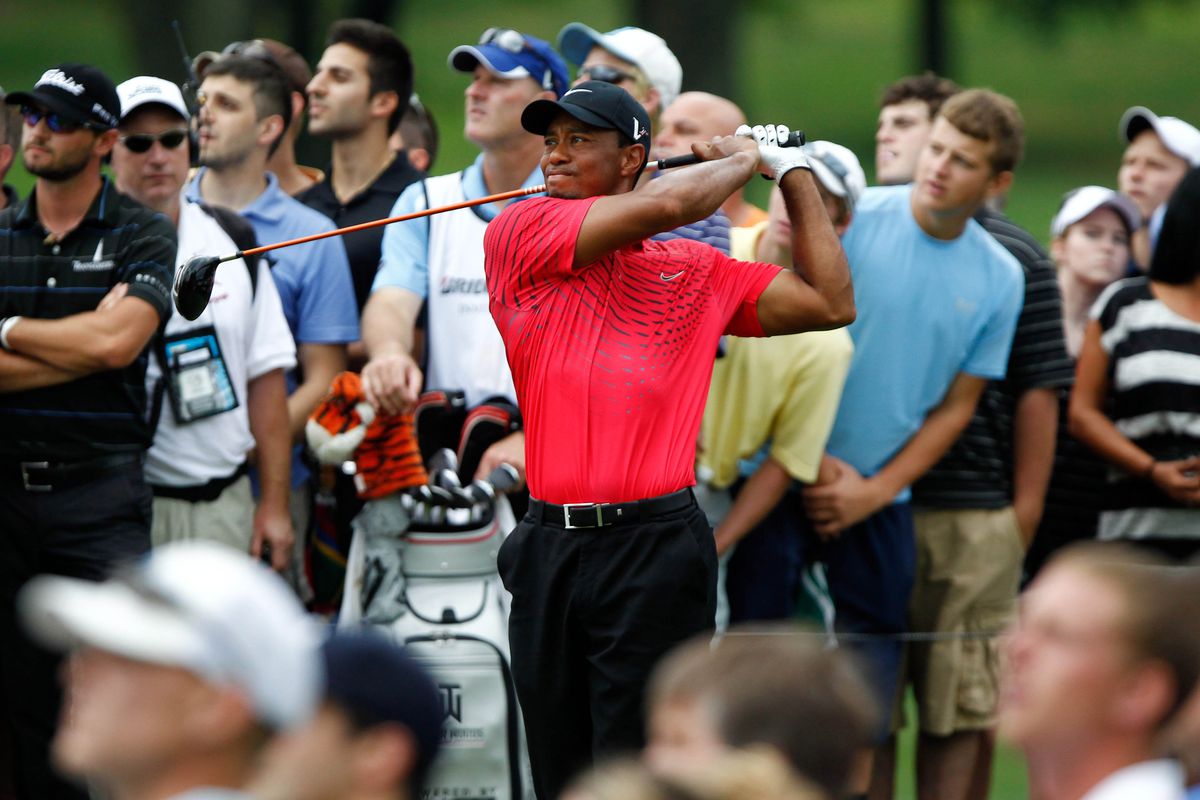 Aug. 5, 2012; Akron, OH, USA; Tiger Woods tees off during the final round of the WGC-Bridgestone Invitational at Firestone Country Club-South Course.  Mandatory Credit: Debby Wong-US PRESSWIRE