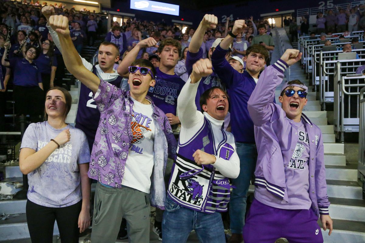 Jan 20, 2024; Manhattan, Kansas, USA; Kansas State Wildcats fans cheer for their team during the second half against the Oklahoma State Cowboys at Bramlage Coliseum.