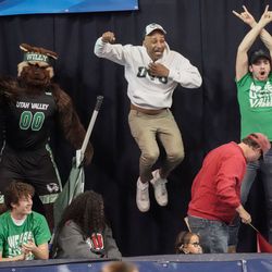 UVU fans cheer as they compete against Utah in an NCAA volleyball game at Smith Fieldhouse in Provo on Friday, Dec. 3, 2021.