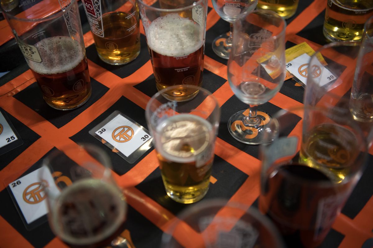 Real Ale Enthusiasts Attend CAMRA Great British Beer Festival