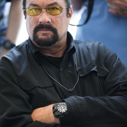 U.S. actor Steven Seagal looks on as he waits for a news conference of U.S. Congressional delegation to Russia in U.S. Embassy in Moscow,  Russia, Sunday, June 2, 2013. A U.S. Congressional delegation to Russia learned little about what could have been done to prevent the Boston Marathon bombings, but got to hang out with Steven Seagal. 