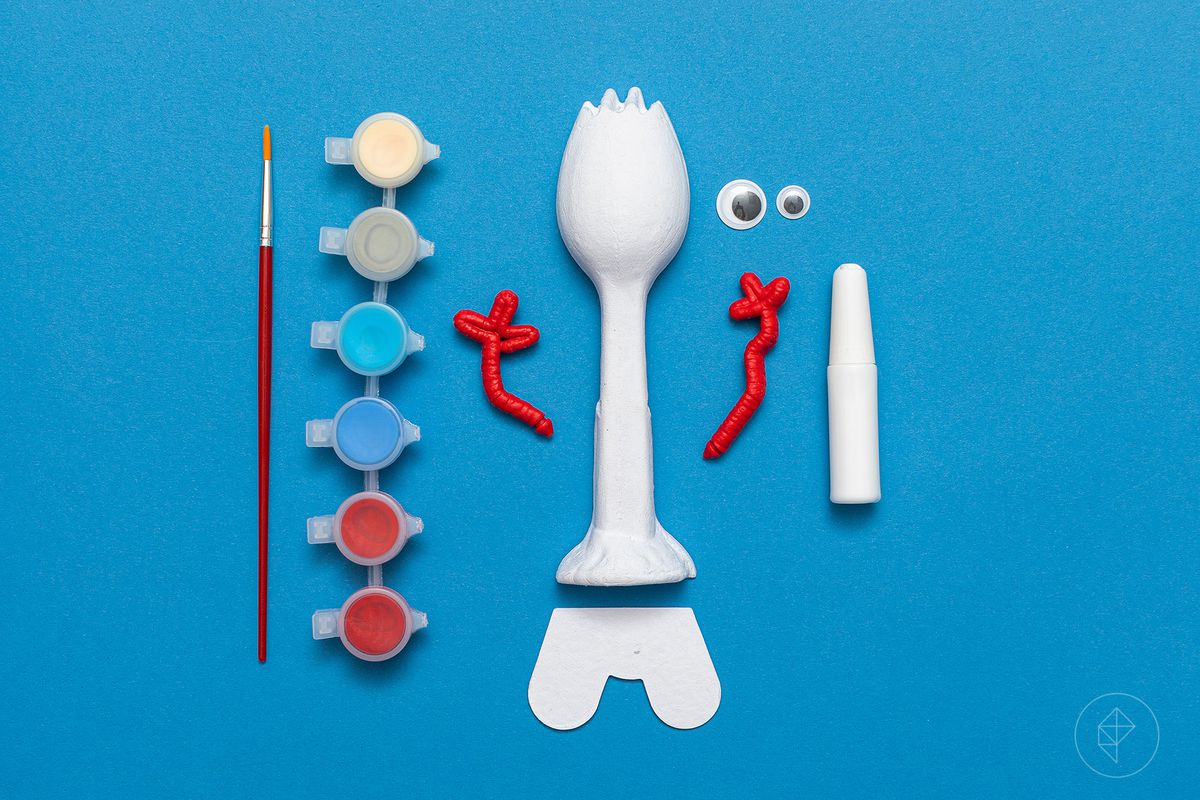 Disney’s Forky kit - paintbrush, paint, arms, spork body, feet, googly eyes, and a container of glue