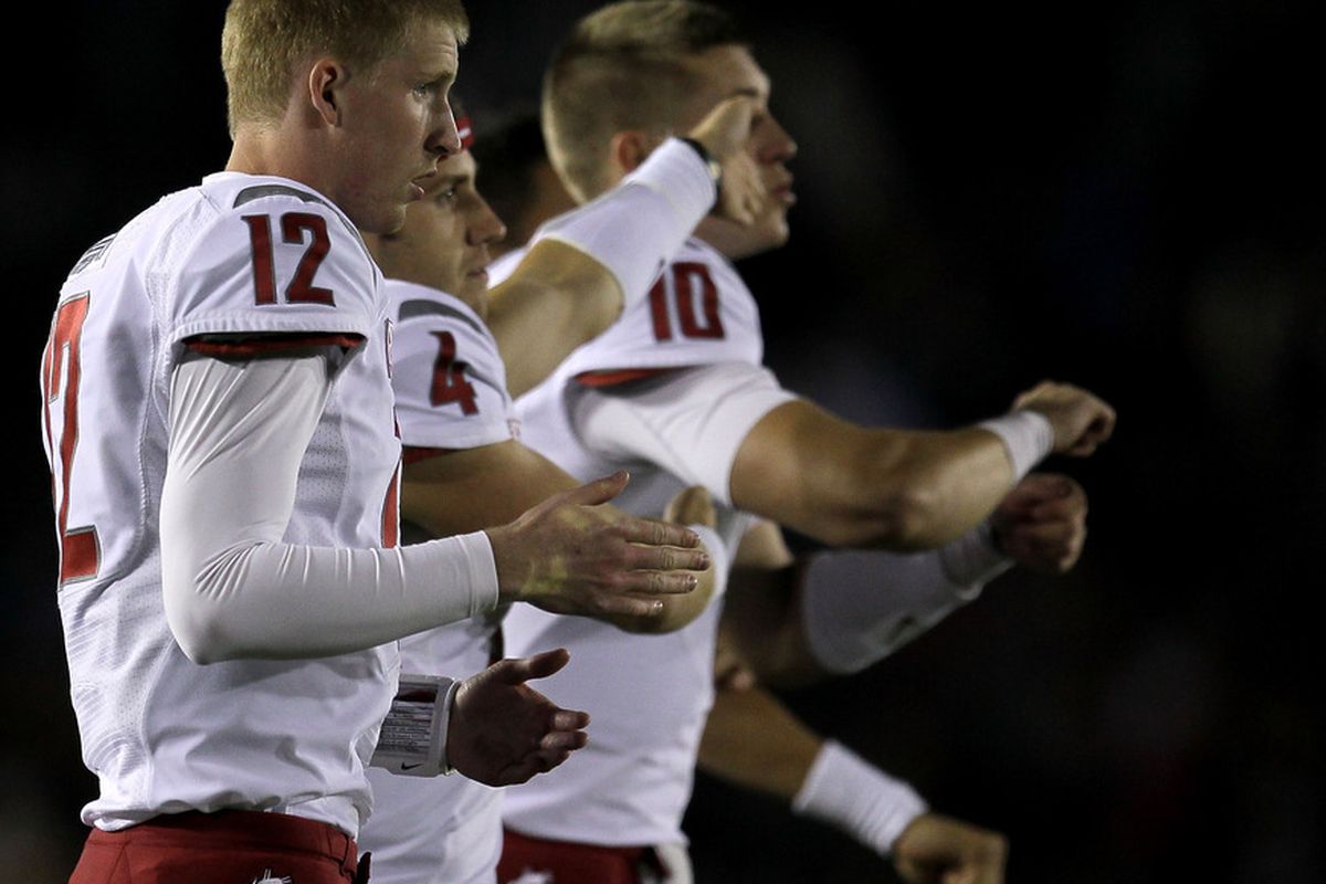 Why is Washington State quarterback Jeff Tuel dancing in the background? Because head coach Paul Wulff says he will see action against Stanford today.