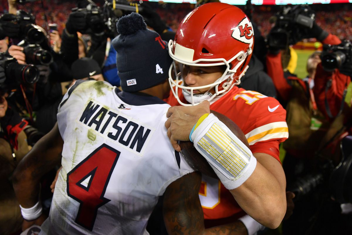 Quarterbacks Patrick Mahomes of the Kansas City Chiefs and Deshaun Watson of the Houston Texans embrace after Chiefs win the AFC Divisional playoff game 51-31 at Arrowhead Stadium on January 12, 2020 in Kansas City, Missouri.