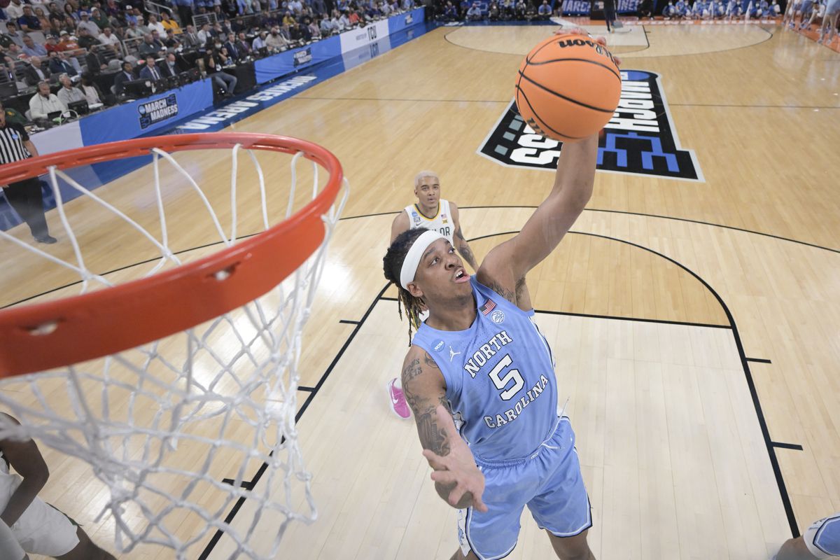 Armando Bacot #5 of the North Carolina Tar Heels rebounds the ball against the Baylor Bears during the second round of the 2022 NCAA Men’s Basketball Tournament held at Dickies Arena on March 19, 2022 in Fort Worth, Texas.