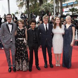 Screenwriter Brian Selznick, left, actors Millicent Simmonds and Jaden Michael, director Todd Haynes, and actresses Julianne Moore and Michelle Williams pose for photographers upon arrival at the screening of the film "Wonderstruck" at the 70th international film festival, Cannes, southern France, Thursday, May 18, 2017.