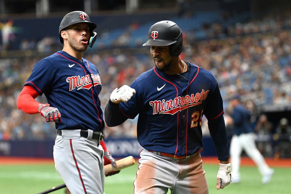 Minnesota Twins center fielder Byron Buxton (25) celebrates with shortstop Carlos Correa (4) after hitting a solo home run in the fourth inning against the Tampa Bay Rays at Tropicana Field.