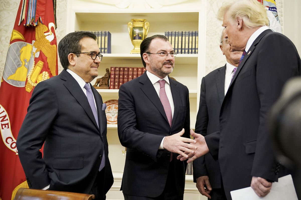 President Trump shake hands with Mexico’s Foreign Minister Luis Videgaray Caso as he arrives to speak on trade in the Oval Office on August 27, 2018. 
